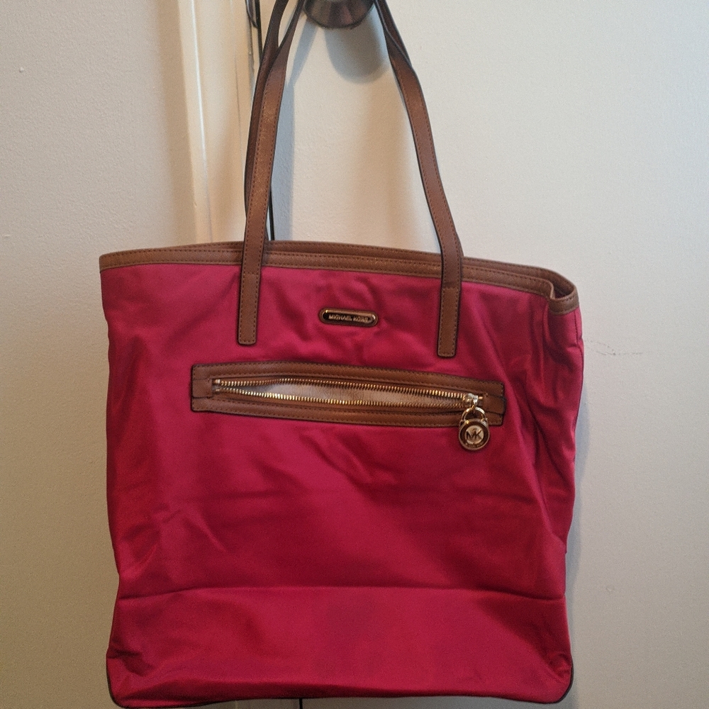 Pink MICHAEL Michael Kors nylon tote.